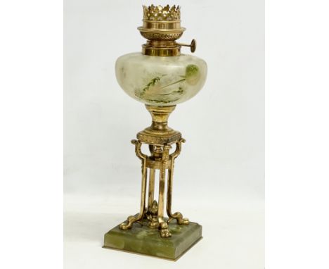 A vintage ornate brass and onyx oil lamp. 38cm 