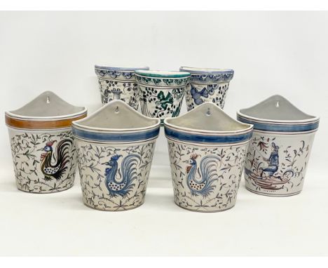 7 vintage Portuguese hand painted pottery wall planters. 4 larger by Outeiro Agueda 17x9x21cm. 3 other 11x6x11cm 