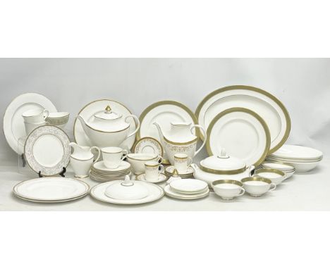 A collection of 50 Royal Doulton tea and dinner ware. Including Royal Doulton Belvedere platter, tureen, 2 dinner plates, 3 s