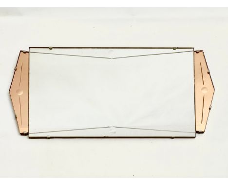 A 1930’s Art Deco stained and bevelled glass wall mirror. 66x33cm. 