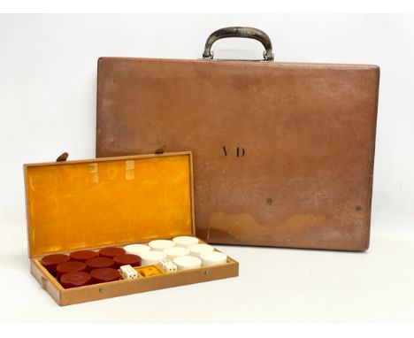 A vintage leather Backgammon game. 54x36cm closed. 