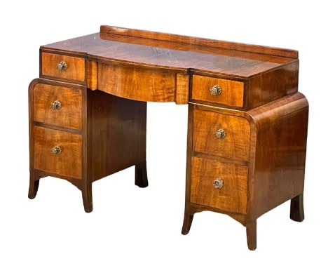 A vintage Art Deco walnut desk. 116x48.5x76cm 