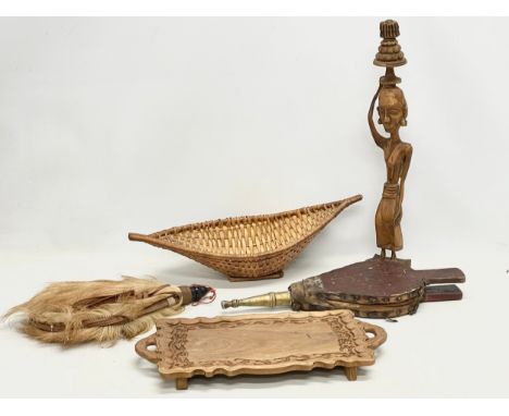 A sundry lot. Including a Spanish Las Tres wine flask. An African figure 50cm. Victorian bellows. 