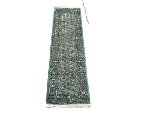 A vintage Middle Eastern runner/rug.  322x81cm 