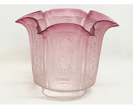 A large Victorian Cranberry Glass oil lamp shade. 20x17.5cm