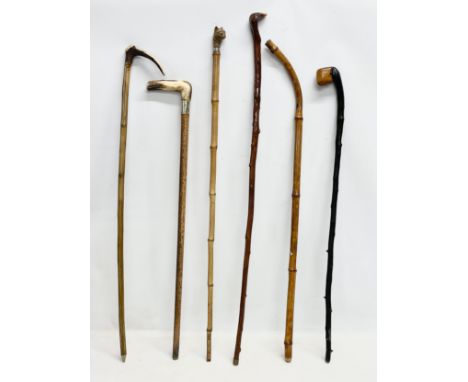 6 vintage walking sticks. 
