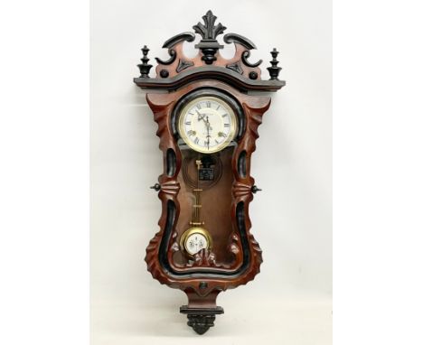 A good quality Victorian style mahogany 31 Day wall clock. With key and pendulum. Orient. 39x88cm 