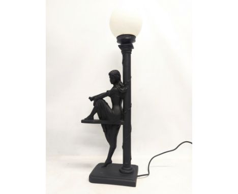 A large figurine table lamp with glass shade. 79cm 