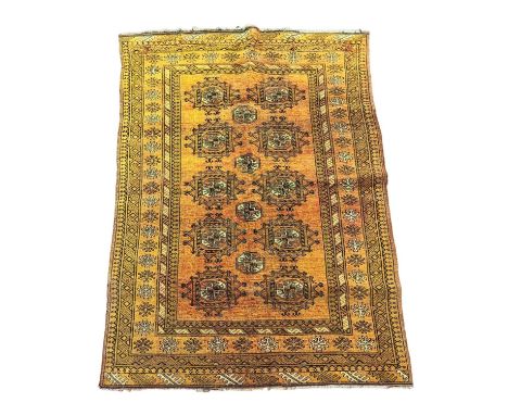 A vintage Middle Eastern hand knotted rug. 140x210cm 
