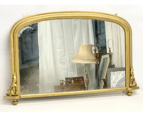 A Victorian gilt framed overmantle mirror. 111x70cm 