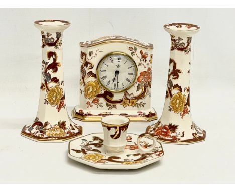 4 pieces of Mason’s Brown Velvet pottery. A pair of candlesticks 16.5cm, a mantle clock 14x13cm, a finger lamp 