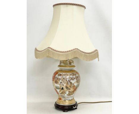 A large Chinese pottery table lamp. Base measures 18x39cm 