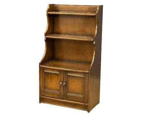 An Ercol open bookcase. 61x35x111cm 