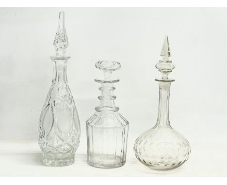 3 crystal decanters. An early 19th century George III 3 ring crystal decanter, circa 1800-1820. An early 20th century Edwardi