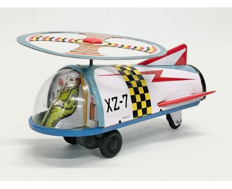 A vintage tinplate XZ-7 Space Helicopter. 17x9cm 
