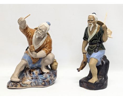 2 vintage Shiwan Chinese pottery Mudmen. Largest measures 19.5cm 