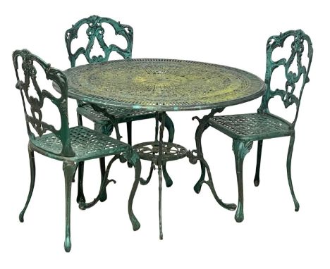 A vintage Victorian style cast alloy garden table with 3 chairs.  105x68cm 