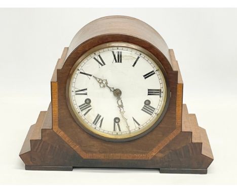 An Art Deco inlaid mantle clock by Enfield. With key and pendulum. 31x15x23cm 