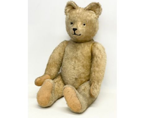 A large vintage teddy bear. 74cm 