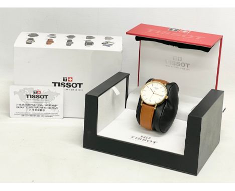 A Tissot T-Classic Everytime gents watch in box. 