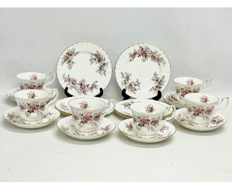 An 18 piece 1961 Royal Albert Lavender Rose tea set. 6 sandwich plates, 6 saucers and 6 cups. 