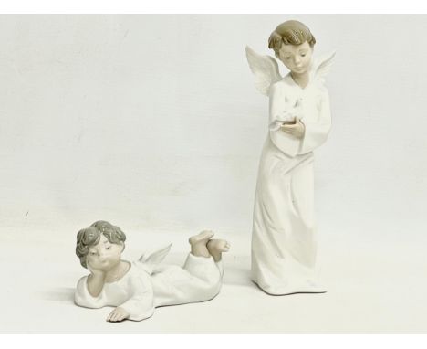 A Lladro figurine and a Nao figurine. 24cm 