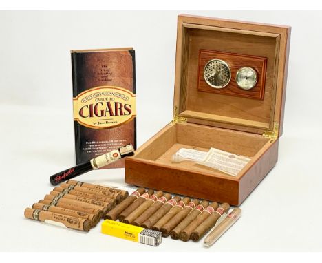 A cigar humidor with a collection of mostly Cuban cigars. Including Romeo Y Julieta, Habana. Romeo Y Julieta Cedros De Luxe n