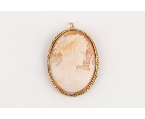 A CAMEO BROOCH/PENDANTThe oval shell cameo carved with a portrait of Erato, enclosed within a conforming twisted-wire frame, 