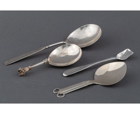 Comprising: a continental silver marriage spoon, circa 1745, a continental silver caddy spoon, maker's mark MH, circa 1900, a