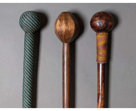 One stick with faceted knob and undecorated shaft; the other two with wirework around the shafts and one with wirework around