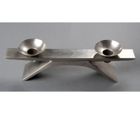Each loose sconce on a horizontal panel, raised on an arched foot9cm high, 32cm wide