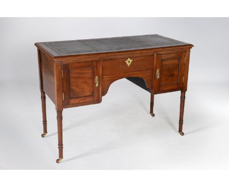 A VICTORIAN MAHOGANY KNEEHOLE DESKThe rectangular top with gilt-tooled leather inset writing surface, a central frieze drawer