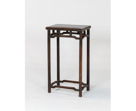 A CHINESE HARDWOOD INCENSE TABLE, LATE QING DYNASTY, EARLY 20TH CENTURYThe rectangular top with a single floating panel above