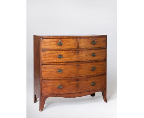 A MAHOGANY CHEST OF DRAWERS, 19TH CENTURYThe bowfronted top above a pair of cockbeaded short drawers, three long graduated co
