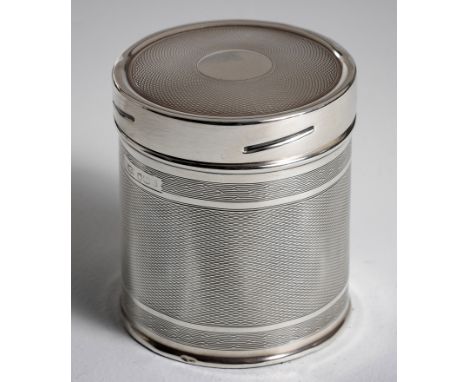 Circular, screw top with vacant circular cartouche, the body engine turned8.5cm high, 104g
