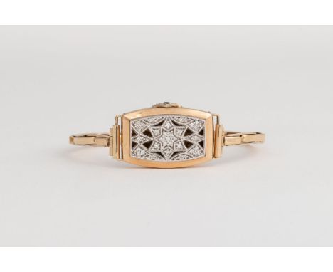 A DIAMOND BRACELETConverted from a wristwatch case and expanding bracelet, centred with a cushion-shaped panel with geometric