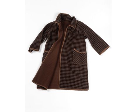 A LADIES VINTAGE COATBrown and black check, brown to the reverseSize: No shown sizeWould fit UK 12 over-sized