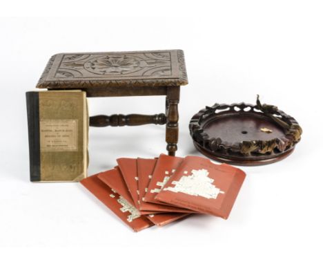 A late 19th Century oak carved footstool,  together with a circular Chinese hardwood stand, several vintage maps and a 'Rudim