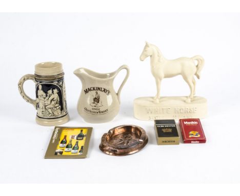 A collection of alcohol related memorabilia, including a J&amp;B jug, a Belgium metal bottle opener in the shape of a putti, 