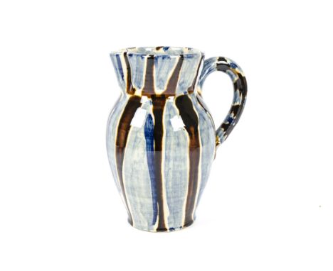 David Garland (b1941-) pottery jug,  earthenware with cream slip, blue and brown brushwork, height 27cm  very small chip to b