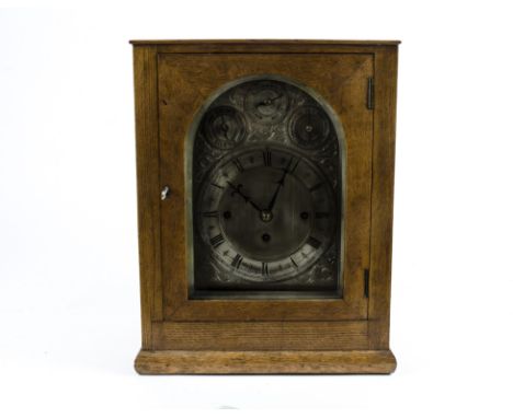 A Regency period chiming mantle clock, 28cm arched silvered dial with a Roman numeral chapter ring, three dials in the arch f