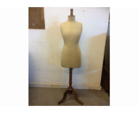 A contemporary Mannequin / Taylors dummy,  fabric covered, raised on a turned column with tripod base, height 160cm 