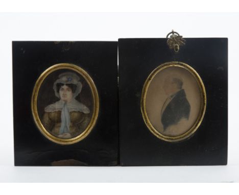 Two Georgian miniature portrait studies,  the first a hand painted portrait possibly on ivory, depicting a lady with curled d