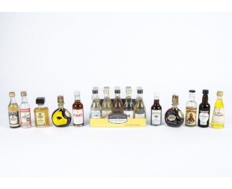 A quantity of miniature collectable spirit and liquor bottles with original contents, over two boxes and another selection in