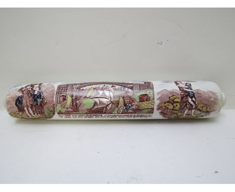 A 19th century earthenware rolling pin decorated with three scenes, The West View of the Cast Iron Bridge at Sunderland, The 