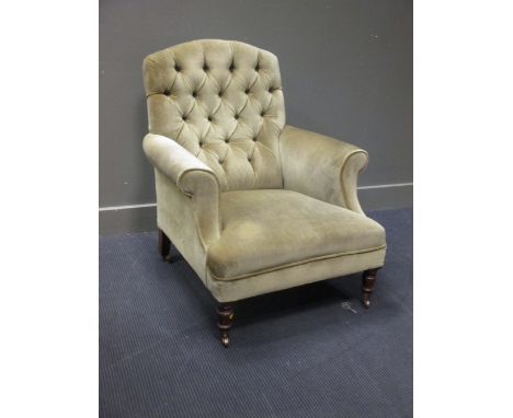 A 19th century green upholstered button-back armchair  
