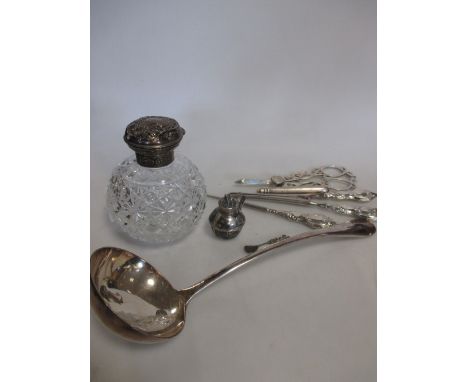 A silver topped dressing table jar with silver handled glove stretcher and button hook and some silver plate and knives and f