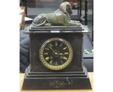 A 19th century black marble mantle clock mounted with a gilt metal Sphinx  