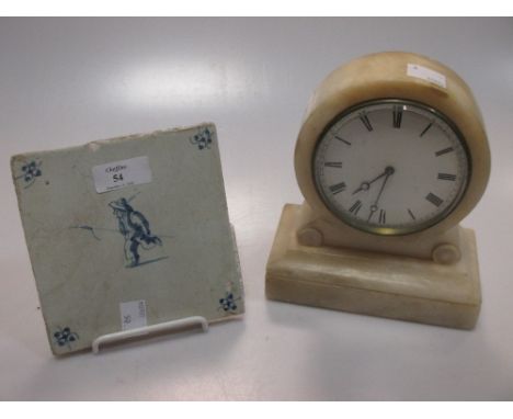A Delft tile, an alabaster mantle clock and nine art nouveau tiles and another (12)  