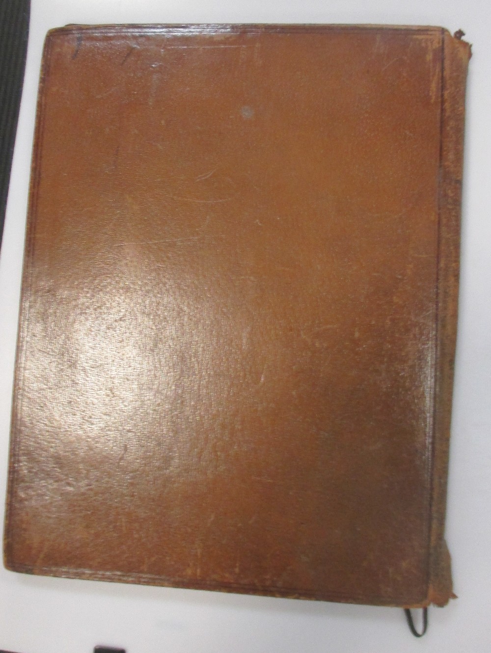 A silver mounted leather desk blotter, with initals and a in